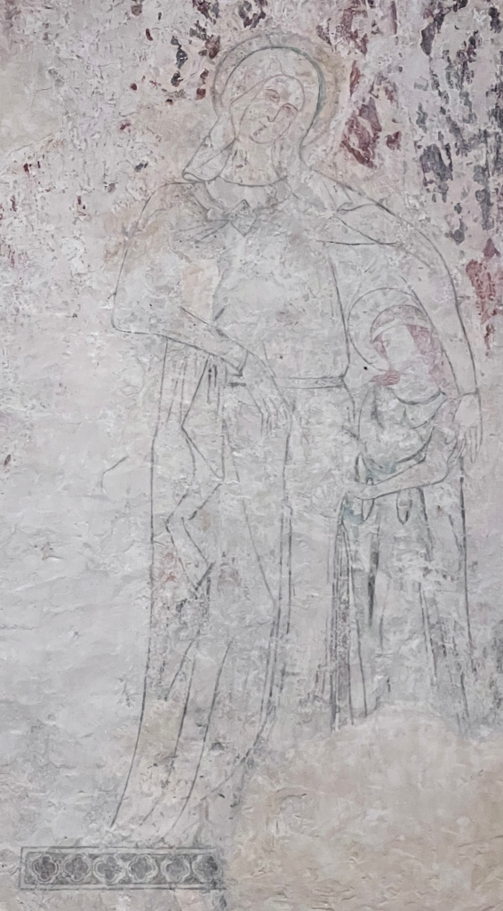 Early 14th century wallpainting of St Anne teaching St Mary to read